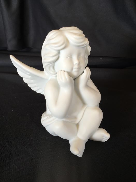 ROSENTHAL STUDIO HAUS BISQUE SEATED CHERUB FIGURINE [Photo 1]