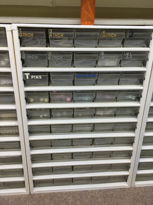 Metal Storage Bin Packed With Pins