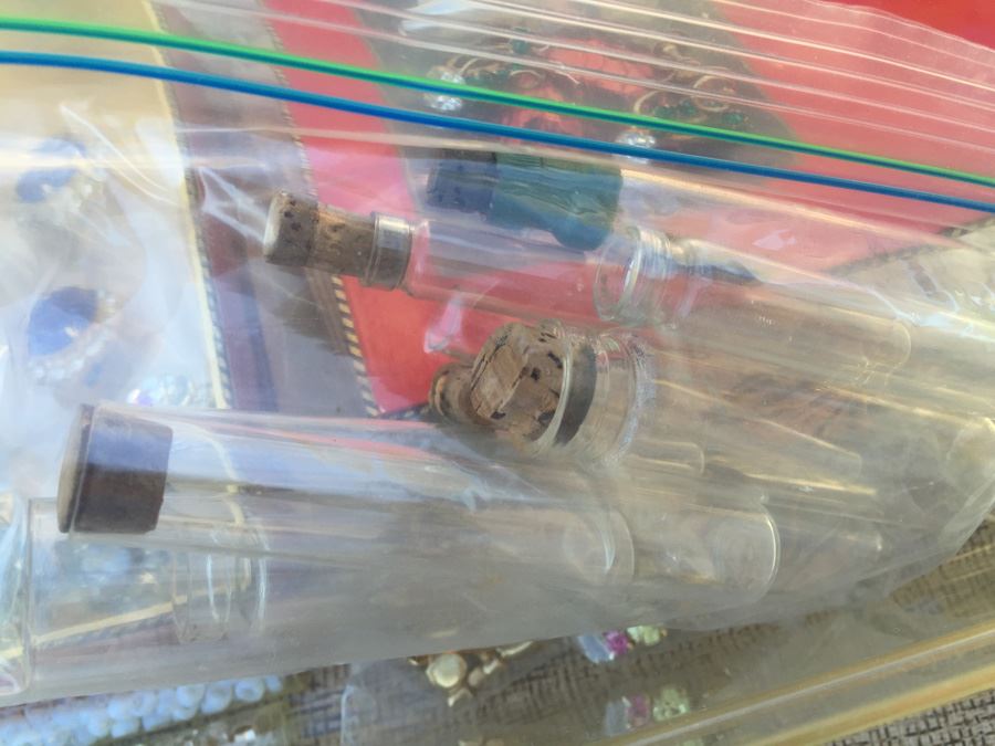 Bin Full Of Jewelry And Glass Vials With Cork Stoppers [Photo 11]
