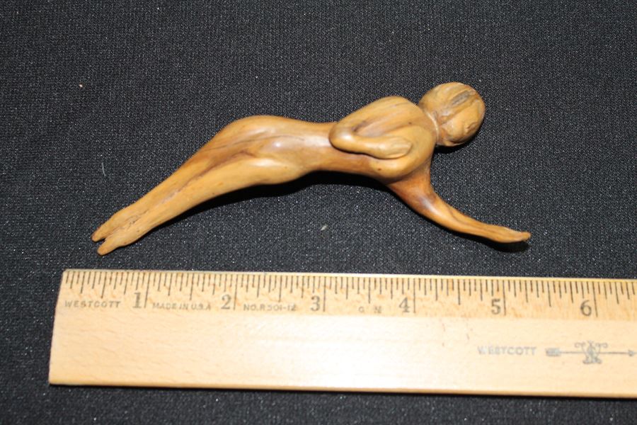Hand Carved Lying Down Woman [Photo 1]