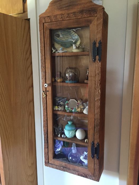 Wall Mounted Cabinet With Items [Photo 4]