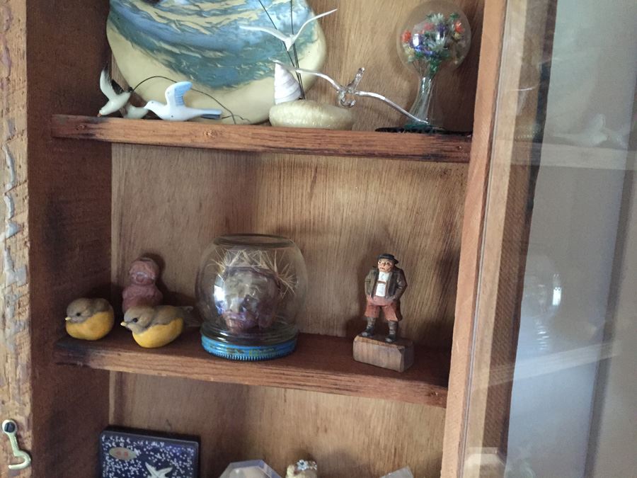 Wall Mounted Cabinet With Items [Photo 8]