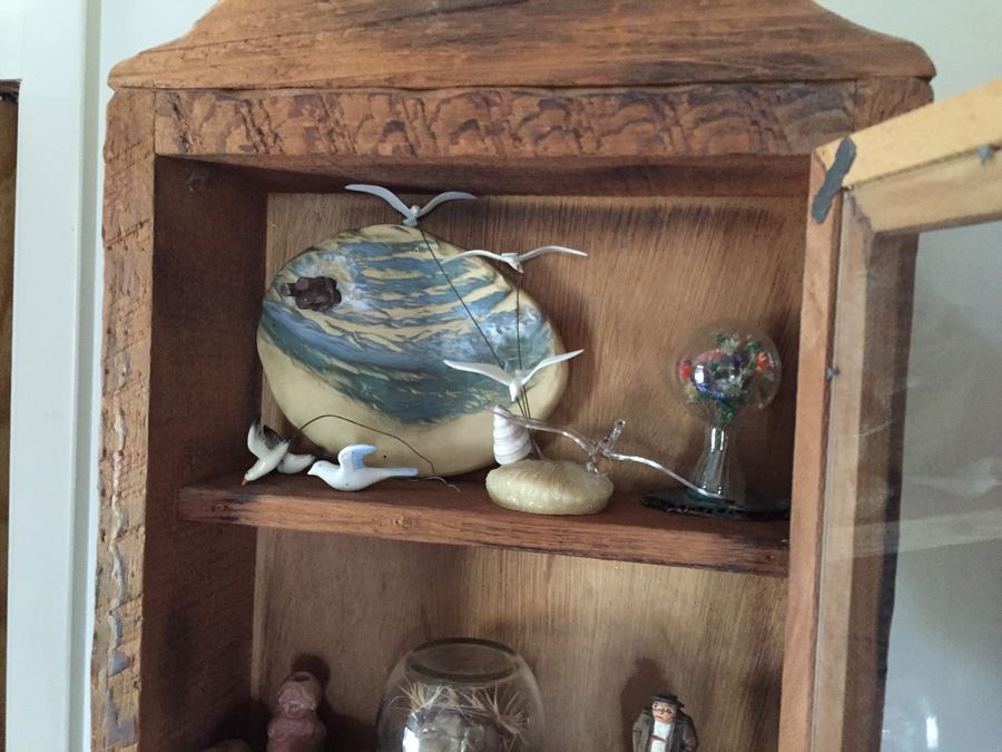 Wall Mounted Cabinet With Items [Photo 2]