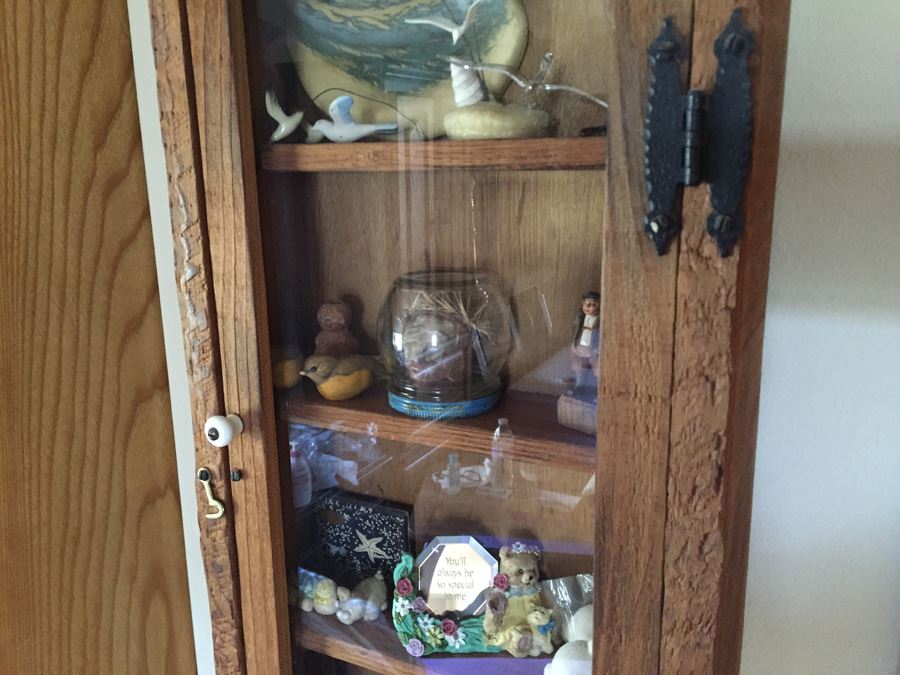 Wall Mounted Cabinet With Items [Photo 6]