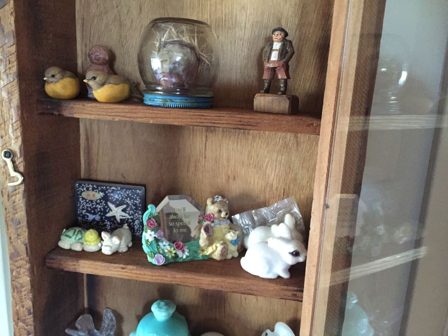 Wall Mounted Cabinet With Items [Photo 3]