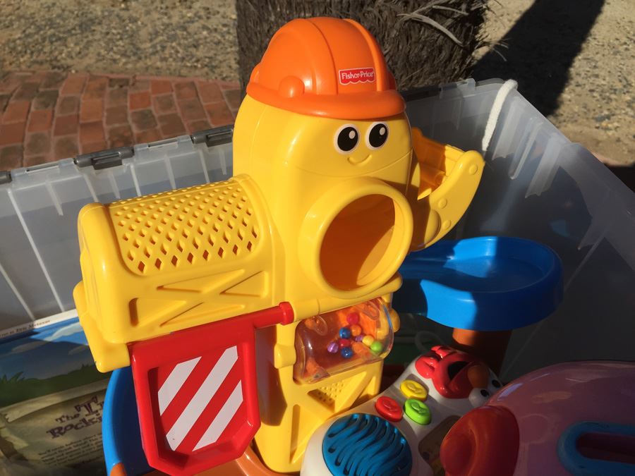Plastic Bin Filled With Kid's Toys [Photo 12]
