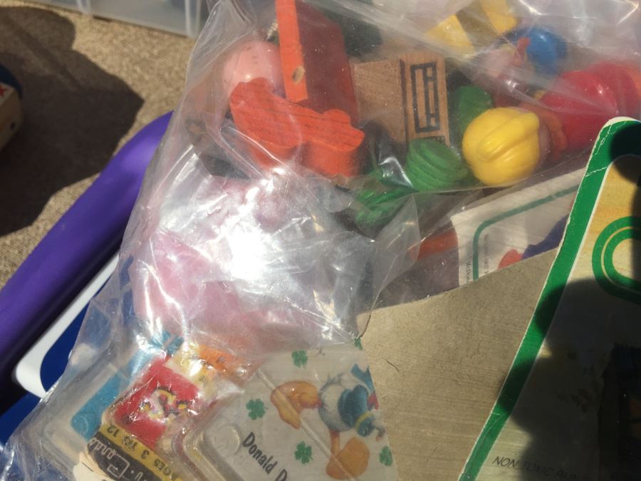 Plastic Bin Filled With Kid's Toys [Photo 8]