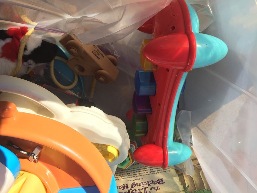 Plastic Bin Filled With Kid's Toys [Photo 11]