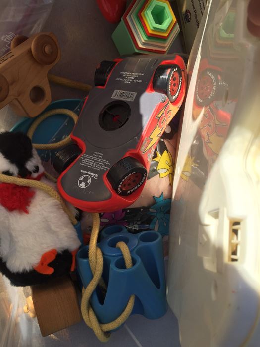 Plastic Bin Filled With Kid's Toys [Photo 15]