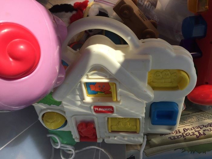 Plastic Bin Filled With Kid's Toys [Photo 13]