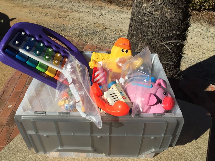 Plastic Bin Filled With Kid's Toys