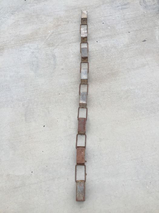 Linked Metal Buckets Great For A Planter [Photo 7]