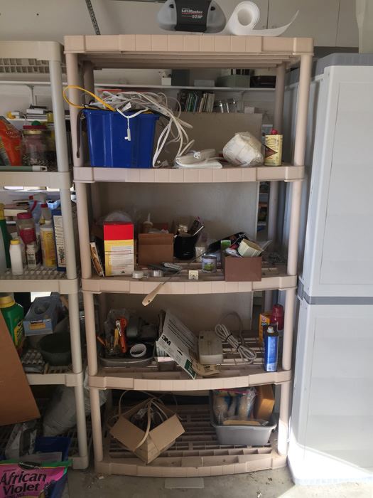 Plastic Outdoor Shelf With Tools And Contents [Photo 1]