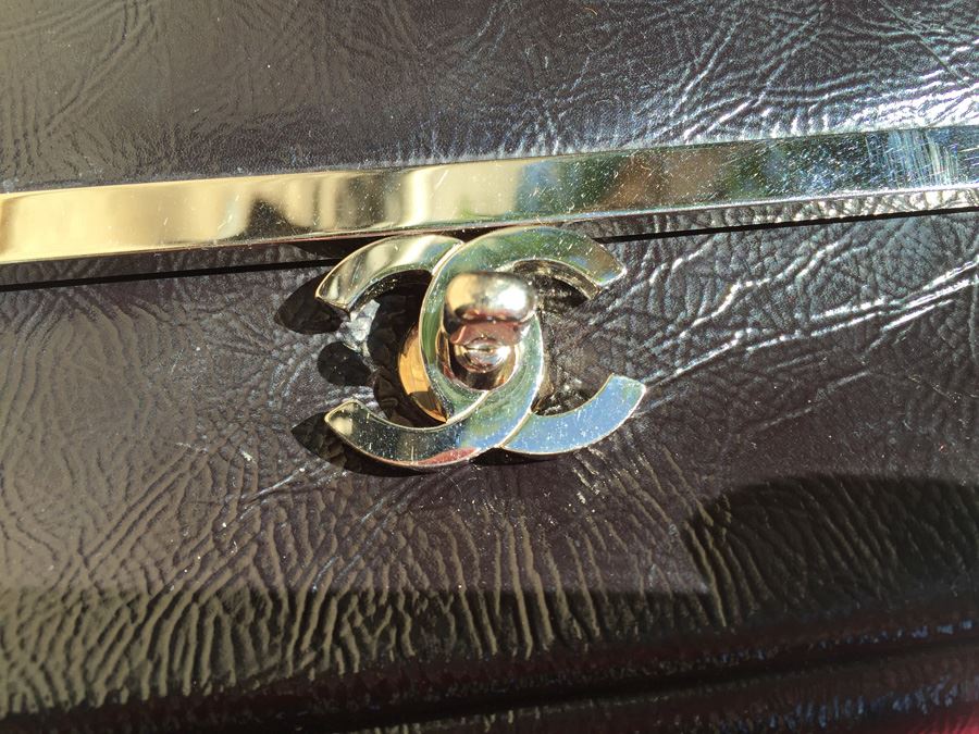 Black Chanel Handbag With Gold Hardware And Chain [Photo 2]