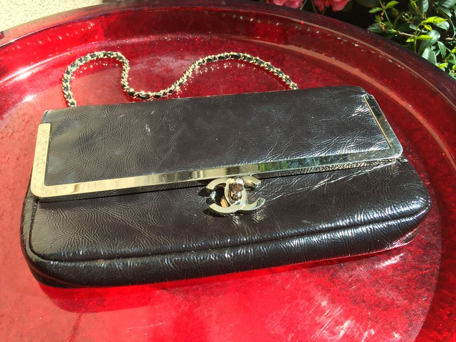 Black Chanel Handbag With Gold Hardware And Chain [Photo 4]