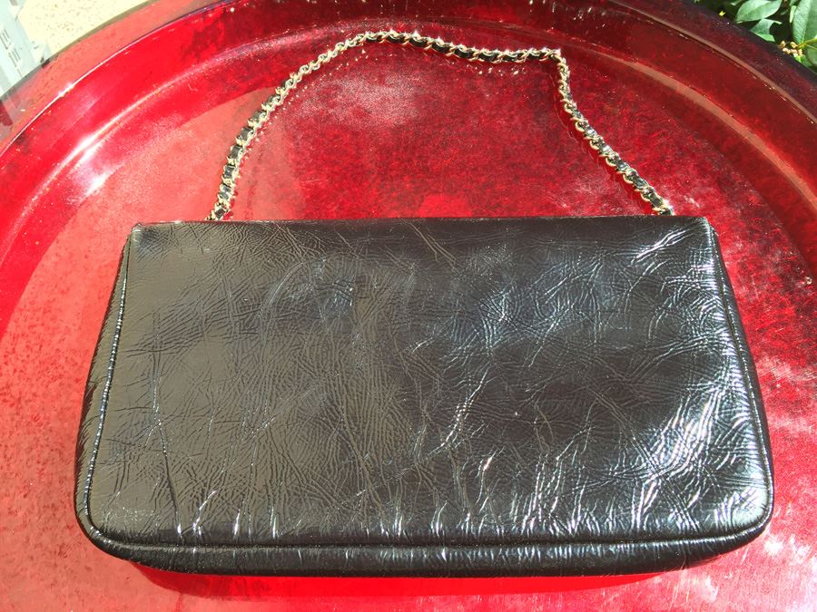 Black Chanel Handbag With Gold Hardware And Chain [Photo 7]