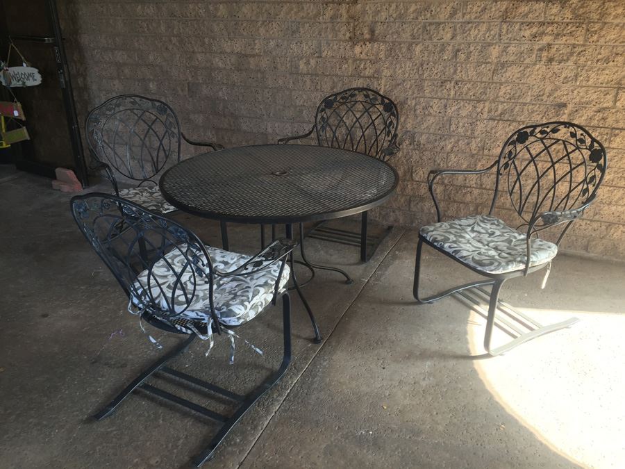 Black Wrought Iron Patio Set With Four Chairs And Seat Cushions [Photo 1]