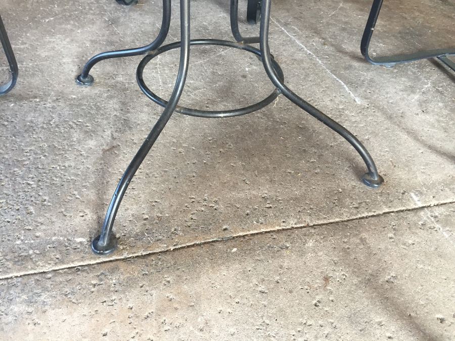 Black Wrought Iron Patio Set With Four Chairs And Seat Cushions [Photo 9]