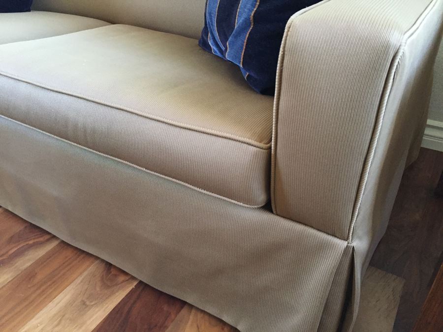 Clean Tan Sofa With Modern Lines And Two Pillows In Excellent Condition [Photo 6]