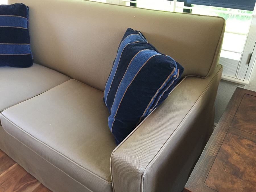 Clean Tan Sofa With Modern Lines And Two Pillows In Excellent Condition [Photo 5]