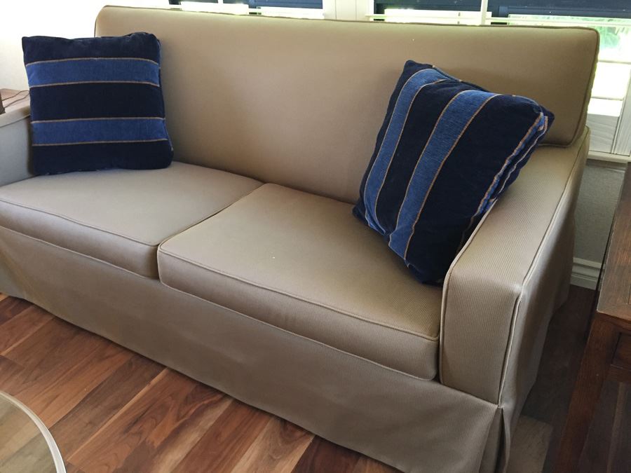 Clean Tan Sofa With Modern Lines And Two Pillows In Excellent Condition [Photo 4]