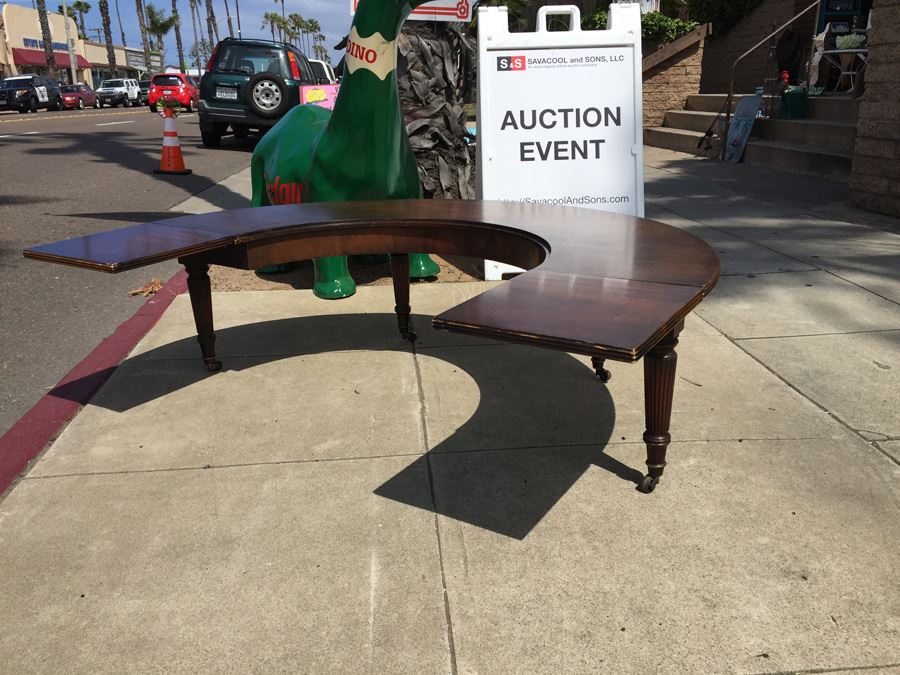 Mid-Century Semi-Circular Coffee Table On Casters Estimate $100-$200 [Photo 11]