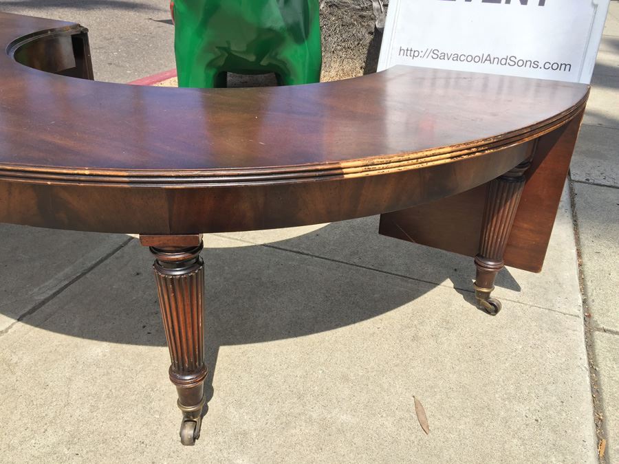 Mid-Century Semi-Circular Coffee Table On Casters Estimate $100-$200 [Photo 4]
