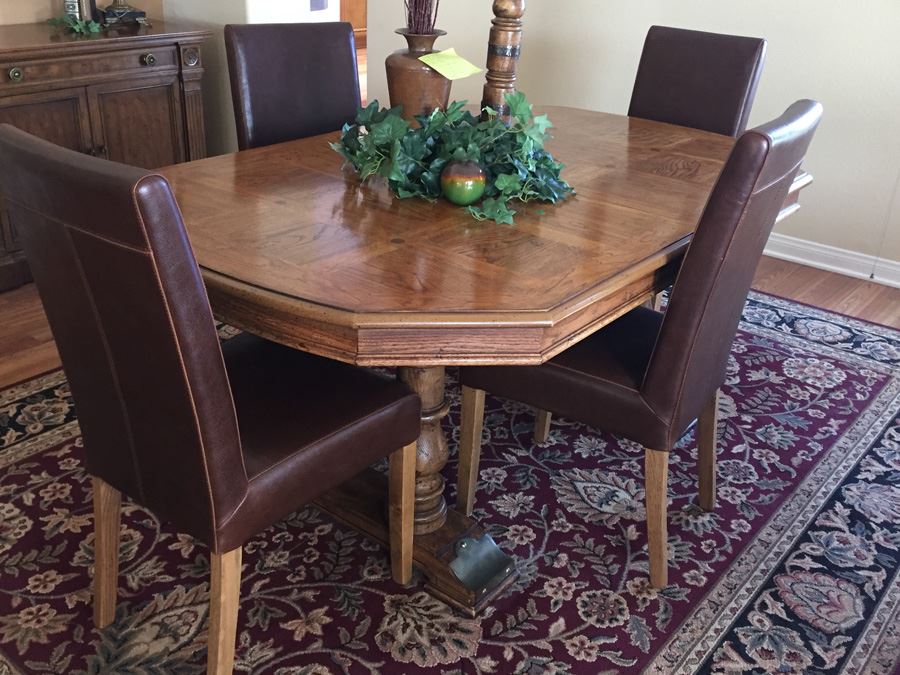 Wooden Dining Table With Four Leather Dining Chairs [Photo 1]