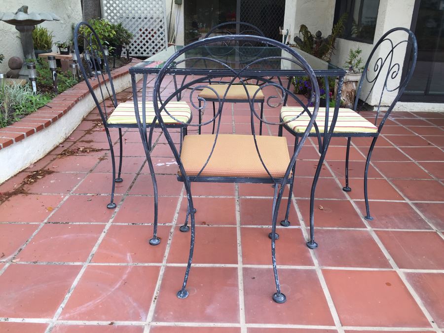 Outdoor Wrought Iron Table With Four Chairs [Photo 2]