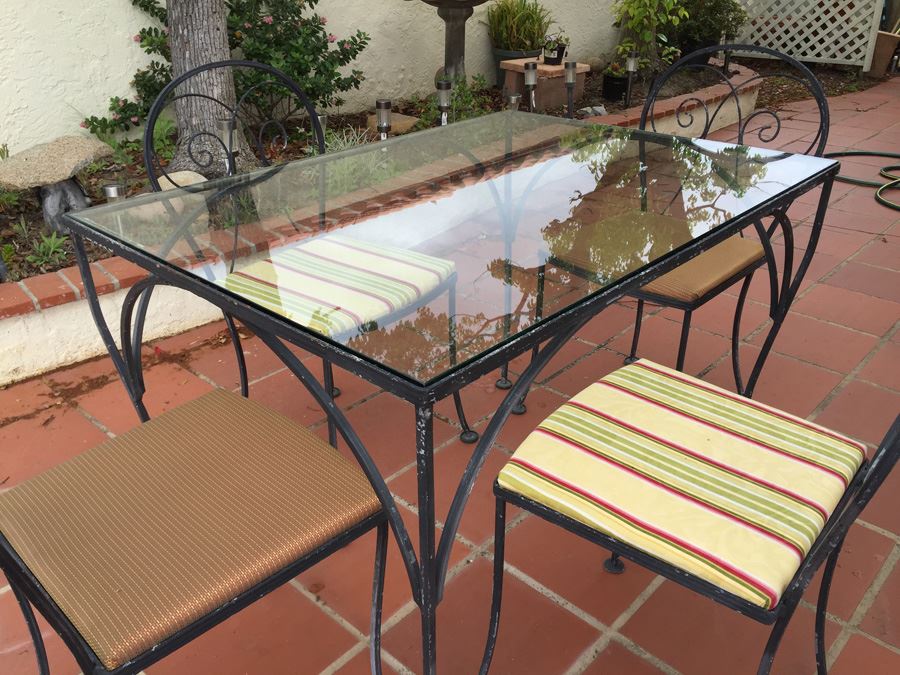 Outdoor Wrought Iron Table With Four Chairs [Photo 3]
