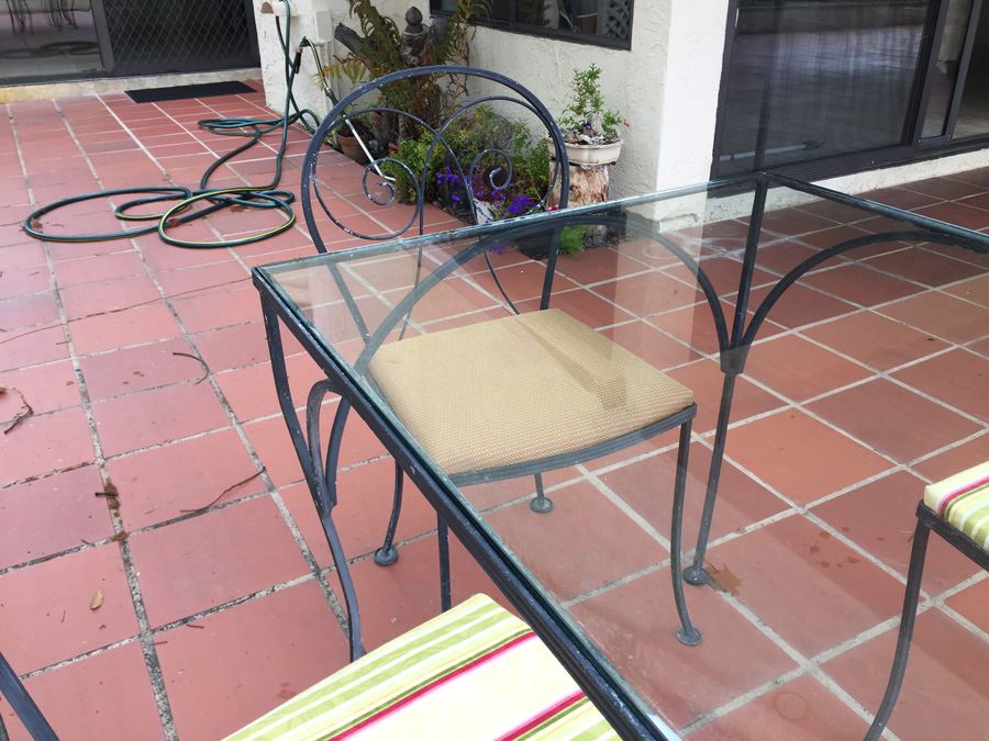 Outdoor Wrought Iron Table With Four Chairs [Photo 10]