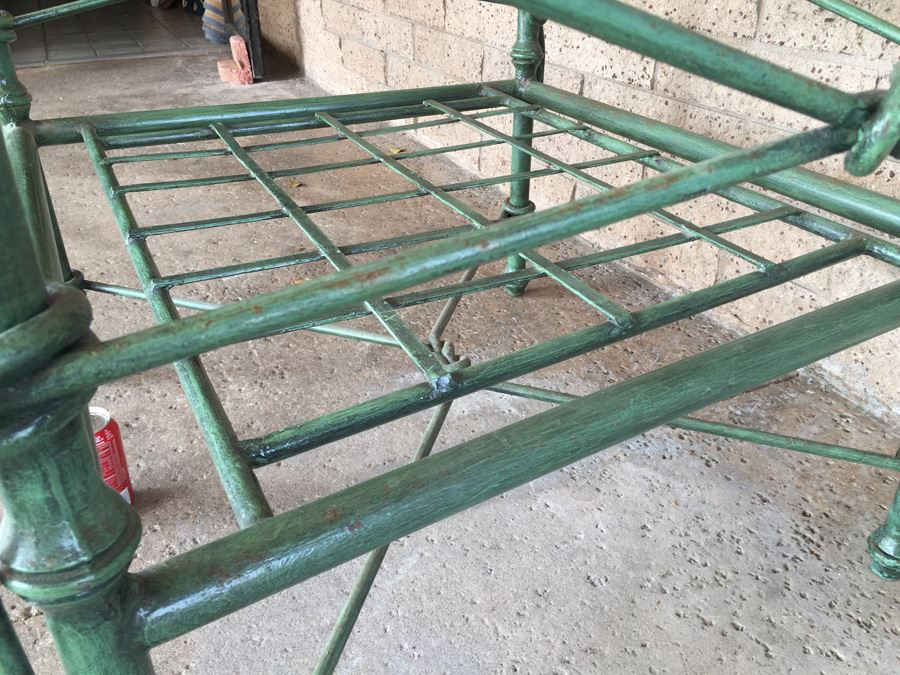 Large Wrought Iron Arm Chair With Rope And Knot Patterns And White Cushions [Photo 10]