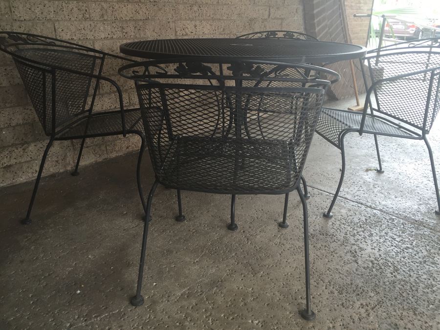 Black Wrought Iron Outdoor Patio Set With Round Table And Four Chairs