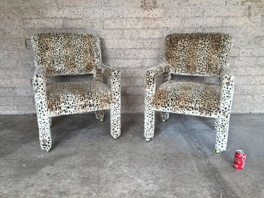 Pair Of Upholstered Classy Faux Animal Print Armchairs On Brass Casters [Photo 1]