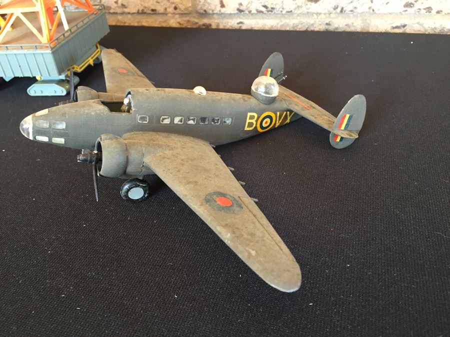 Vintage Rocket On Launch Pad And Aircraft [Photo 3]