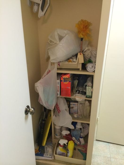 Contents of Cleaning Closet with Wooden Shelf