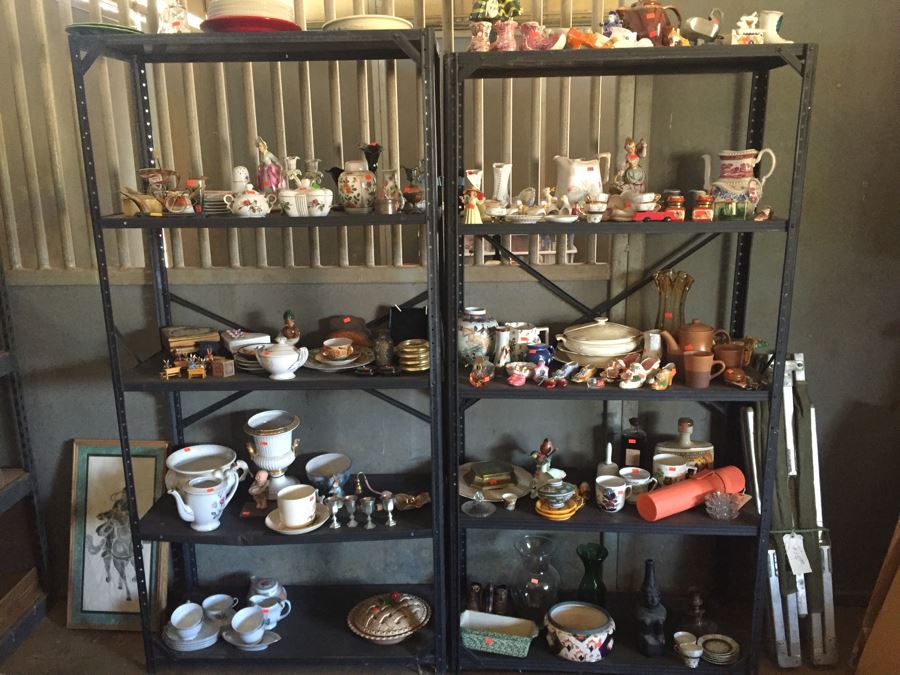 Two Metal Shelves Full Of Various Items From Home And Former Antique Store Plus Metal Shelving
