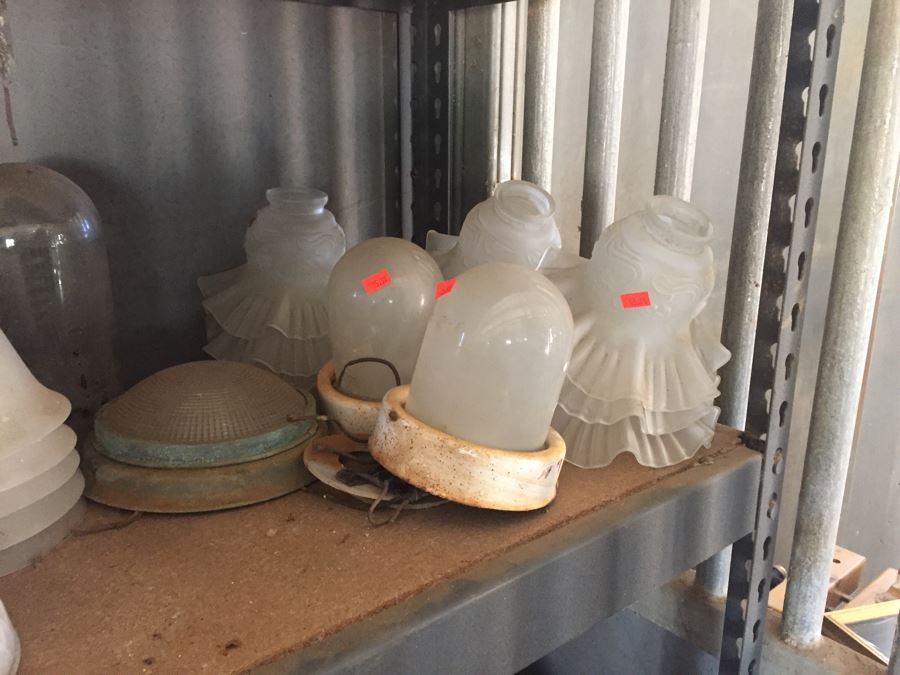 Metal Cabinet With Glass Light Shades And Figurines Includes Metal Shelving [Photo 11]