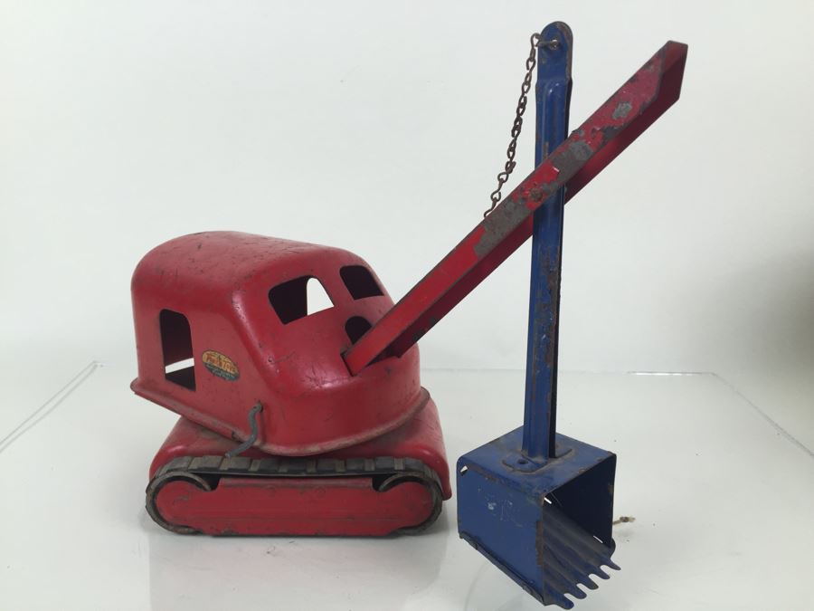 antique metal toy crane