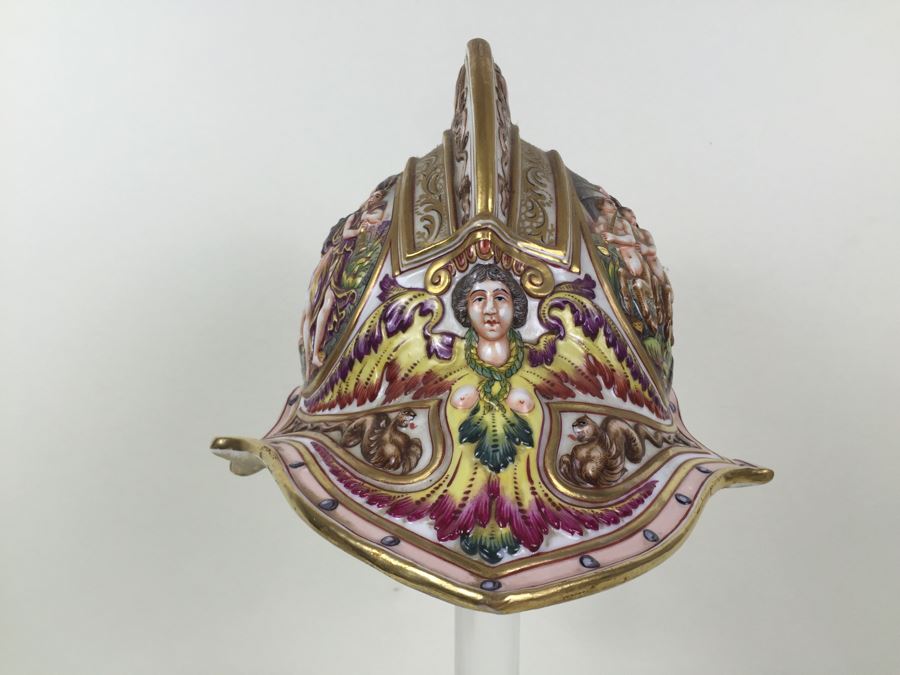 Stunning Capo Di Monte Porcelain Renaissance-Style Helmet With Lucite Display Stand Relief Molding With Scenes Of Griffins Estimate $1,200 [Photo 13]