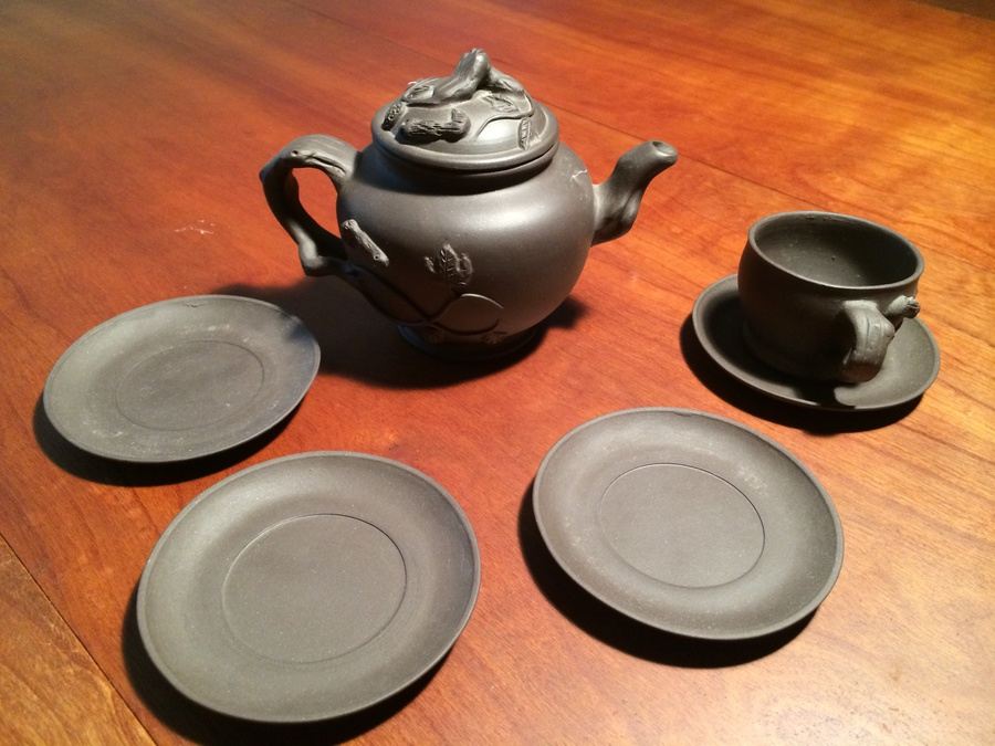 Handmade Teapot with (1) Cup and Saucer and (3) Extra Saucers [Photo 1]