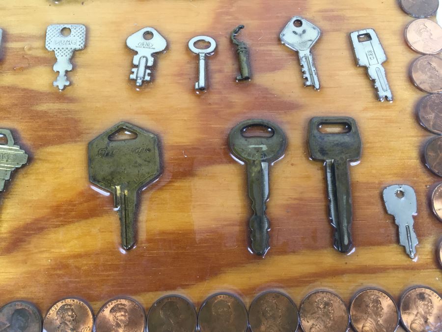 Folk Art Piece Showing Various Keys Surrounded By Pennies [Photo 10]
