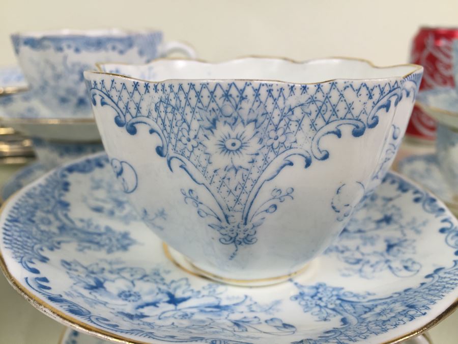 Elegant Set Of Gold Rimmed Blue And White Cups And Saucers With Plates And Bowl [Photo 9]