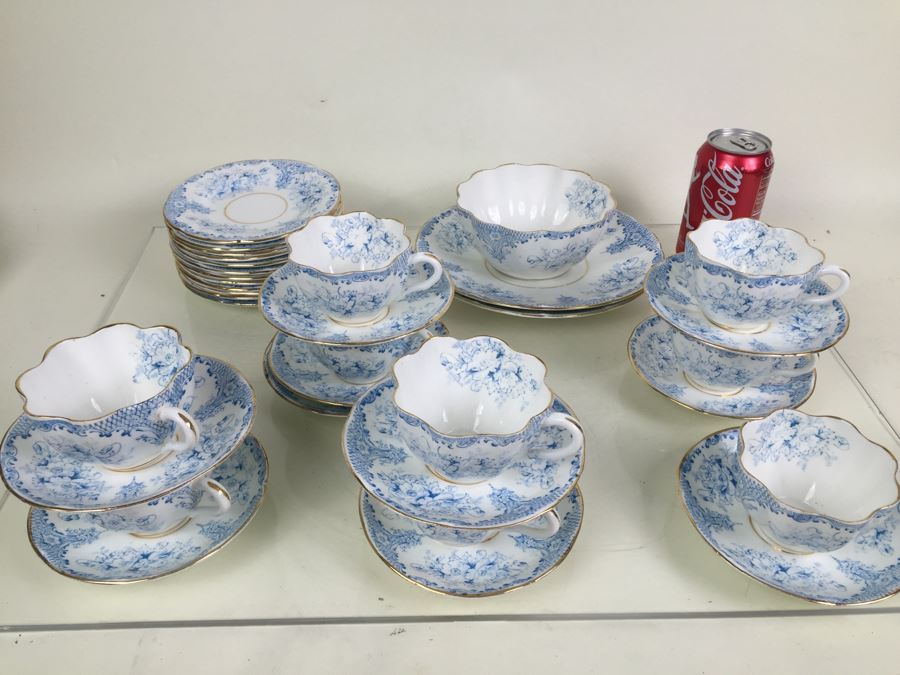 Elegant Set Of Gold Rimmed Blue And White Cups And Saucers With Plates And Bowl [Photo 1]