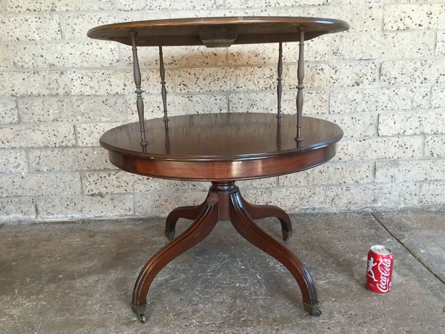 Vintage 2-Tier Wood And Brass Pedestal Table On Casters