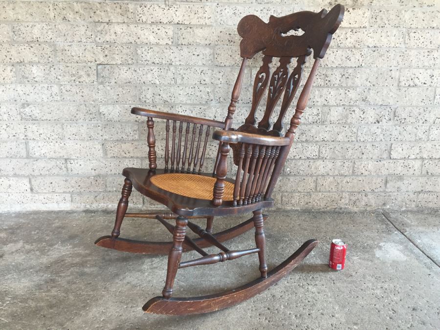 Nice Antique Cane Seat Rocking Chair With Dragon And Floral Motif Carvings