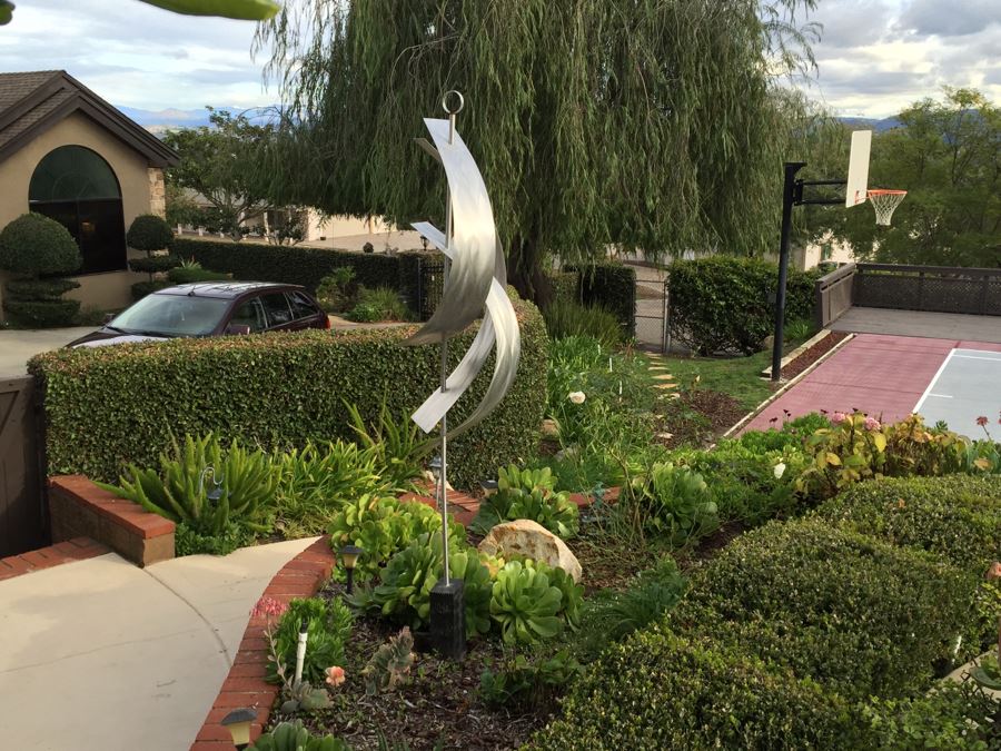 Modern Metal Sculpture On Wooden Base [Photo 16]