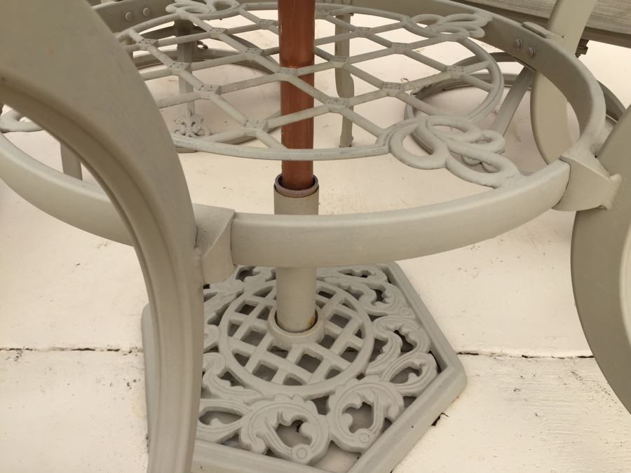 Outdoor Patio Table With Six Swivel Chairs And Umbrella [Photo 9]