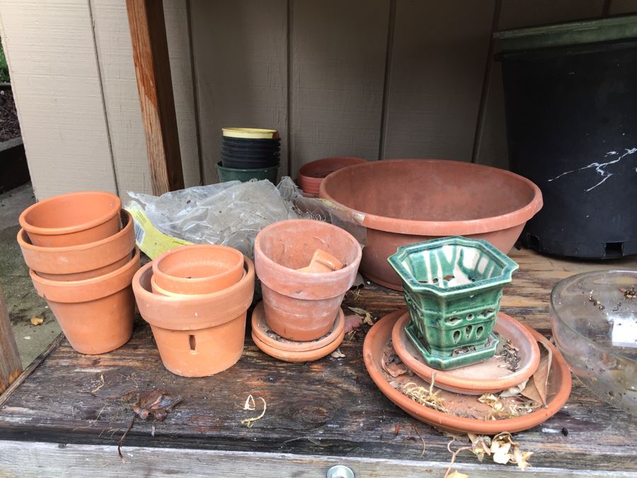 Outdoor Garden Table With Blue English Bench Vice, Various Pots And Partial Weather Vane [Photo 5]