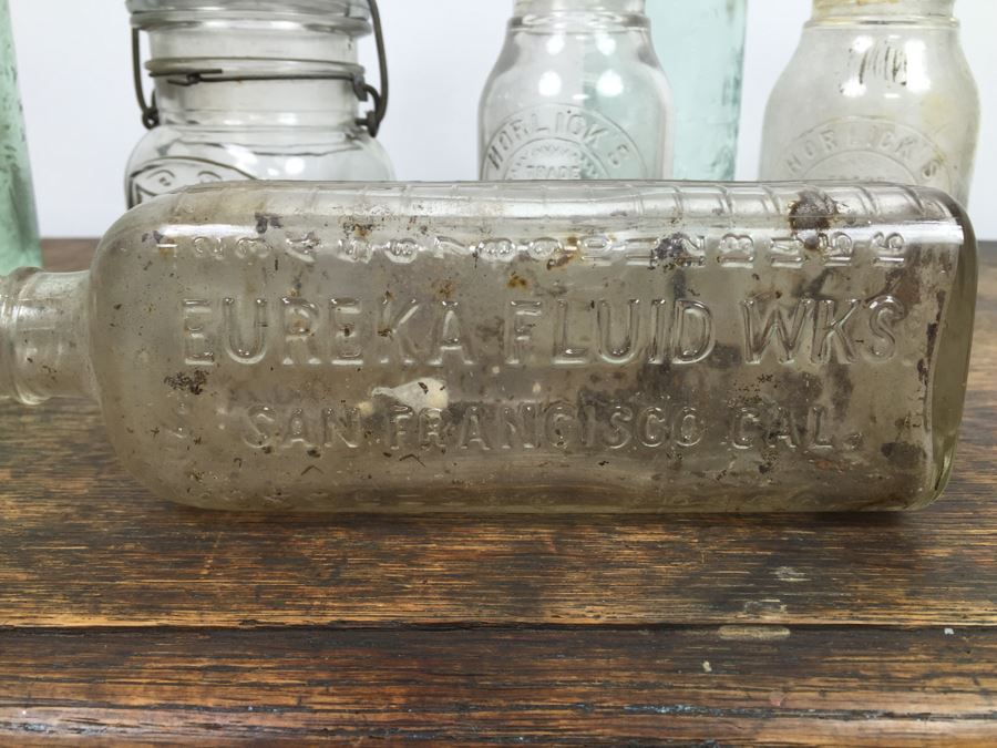Collectible Clear Glass Advertising Bottles [Photo 8]